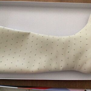 Katy Perry studded knee high boot in vanilla.  NIB.  Size 9.